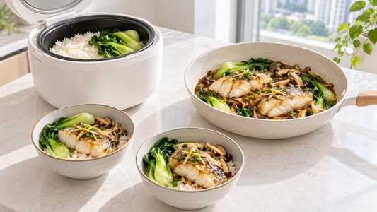 Bright one-pan ginger soy fish dinner with rice cooker rice, bok choy, mushrooms, and two serving bowls