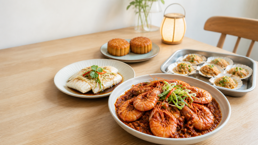 Bright Mid-Autumn table with sambal prawns, soy fish, half-shell scallops, mooncakes, and a lantern