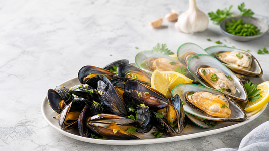 Black and green-lipped mussels prepared with lemon, garlic, and parsley