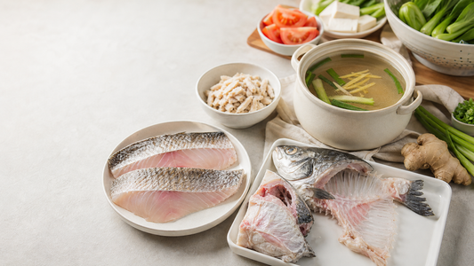 Whole fish divided into fillets, collar, head, bones, broth, and cooked flakes for several family meals